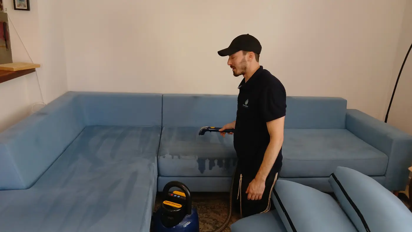 Hot-water extraction on an L-shaped sofa in a Jerusalem living room