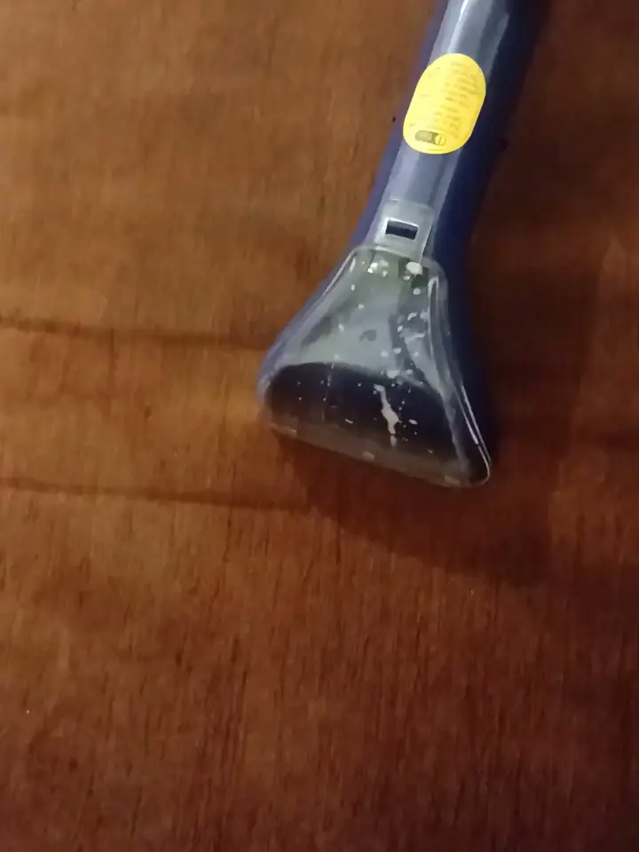 Dirt rising into the nozzle on a fabric sofa